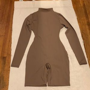 NWT Skims ALL-IN-ONE LONG SLEEVE MID THIGH ONESIE
